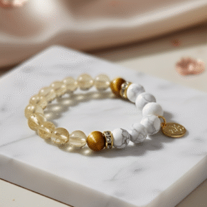 The Calm Mogul crystal bracelet for success and confidence with golden Citrine, Yellow Tiger Eye, and white Howlite.
