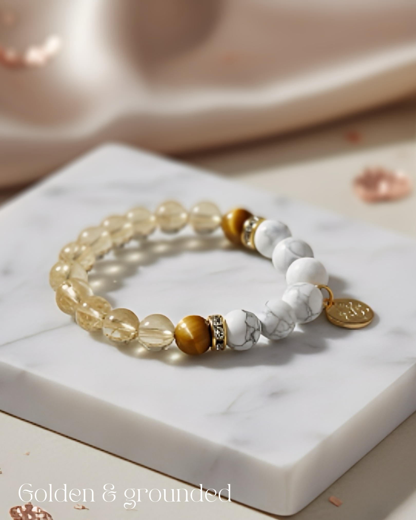 The Calm Mogul crystal bracelet for success and confidence with golden Citrine, Yellow Tiger Eye, and white Howlite.