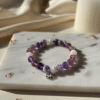 The Mystic's Insight spiritual protection and intuition bracelet with purple Amethyst and Lepidolite stones.