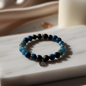 The Visionary's Compass bracelet for clarity and creative communication, with Blue Tiger Eye, Apatite, and Obsidian.