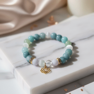 The Ocean's Whisper emotional healing and communication bracelet with pastel Aquamarine, Morganite, and Amazonite beads.